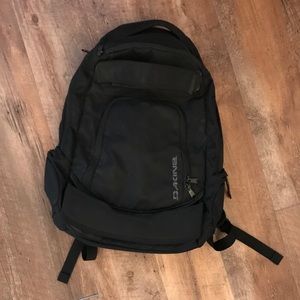 Black Dakine Backpack with Board Straps